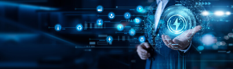 Fototapeta premium Tech hand holding ENERGY TECHNOLOGY network grids. Developing sustainable power solutions and renewable resources for a green world. Modern engineering drives future utility efficiency.