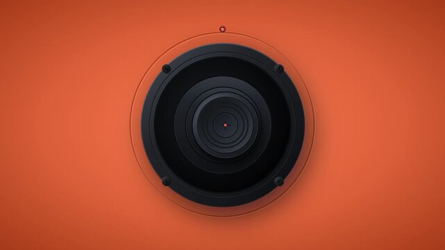 Black speaker cone vibrating and pulsing on an orange background