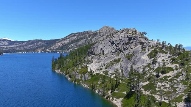 Echo Lakes and summit with desolation wilderness taken from a aerial point of view. The burn scars from the 2022 Caldor fire are evident and the forest hasn&rsquo;t recovered yet. Views also of  Lake Tahoe.