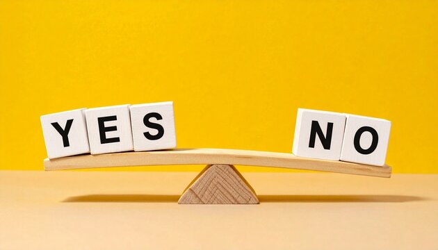 Wooden balance scale cubes spelling yes no decision concept