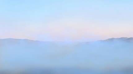 Fototapeta premium Soft Morning Fog Blanketing Mountain Valleys Under a Pastel Sky Creating a Mystical and Dreamy Atmosphere