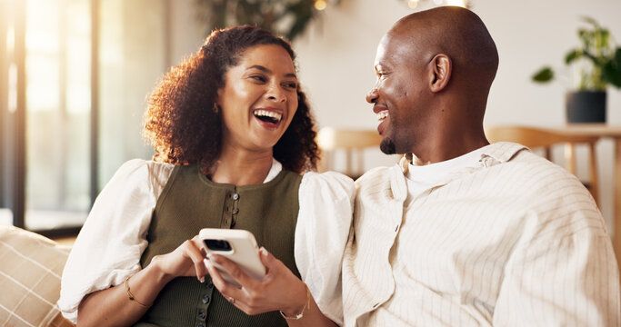 Couple, relax and laugh in home with phone, online entertainment and funny meme for bonding together. Married, African people and browsing on sofa with tech, humor and social media for internet joke.