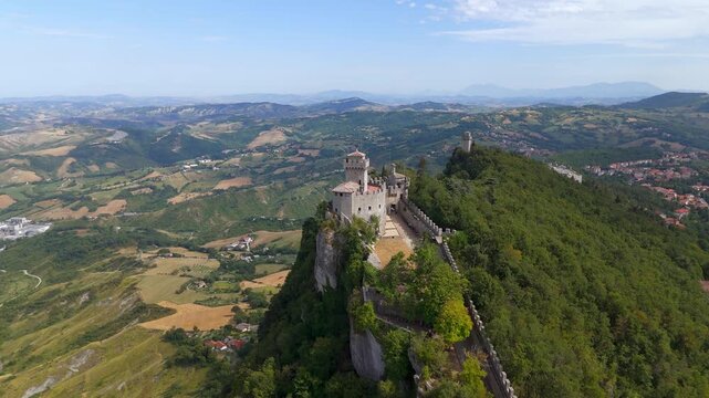Aerial drone flight over Cesta Tower on Monte Titano, San Marino