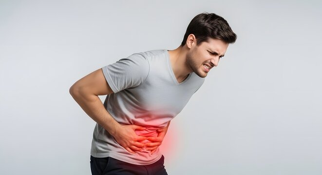 Individual experiencing sharp abdominal pain with red highlighted area. Appendicitis or digestive issue concept. Man pressing his hands against his aching side in distress.