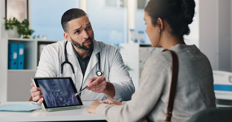 Fototapeta premium Tablet screen, consultation and doctor with woman for xray in hospital for medical diagnosis. Discussion, digital technology and healthcare worker with female patient for radiology scan in clinic.
