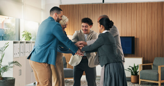 Team building, business people and stack hands in office for cooperation, support or goal motivation. Group, excited or collaboration with employees for solidarity, mission or cohesion with diversity