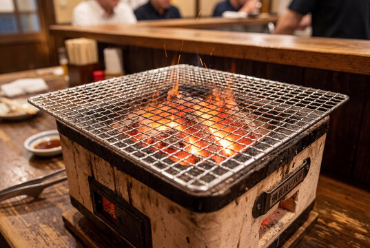 Traditional japanese hibachi grill with hot coals