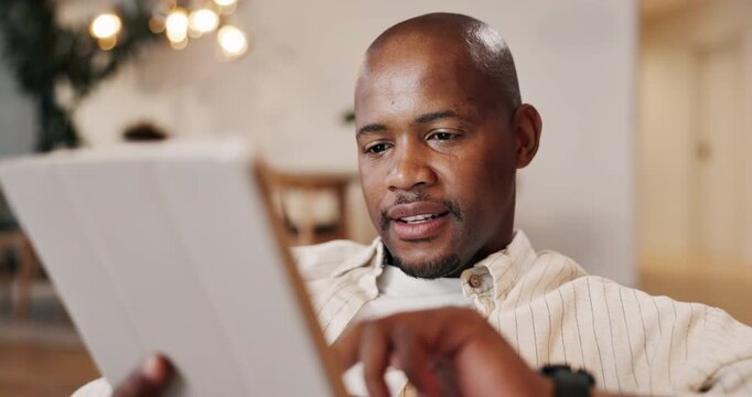 Thinking, black man and remote work in home with tablet, research and proofreading for copywriting. Male person, journalist and freelancer at house with digital, editing article and story publication