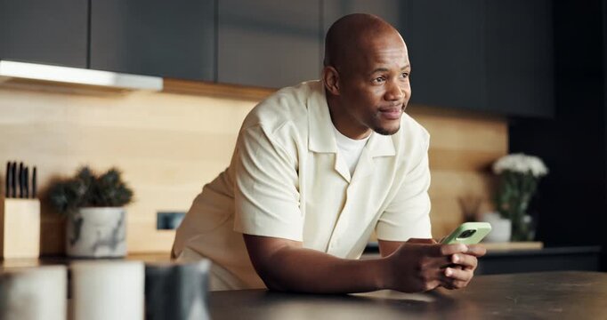 Happy, man and thinking in home with phone, contemplating text message and typing for online dating app. Black person, smile and vision in house with tech, social media and thoughts for digital chat.