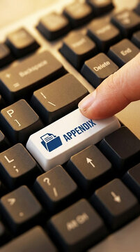Finger pressing an "Appendix" key on a keyboard, symbolizing digital data access, research, and document management, suitable for technology and business themes