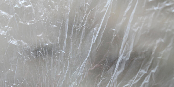 Clear plastic texture background that is wrinkled and wrinkled