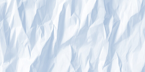 Obraz premium Crumpled white paper texture background with soft blue shadows and creases