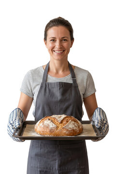 Smiling woman in apron holding a fresh loaf of bread on a baking sheet isolated on transparent background