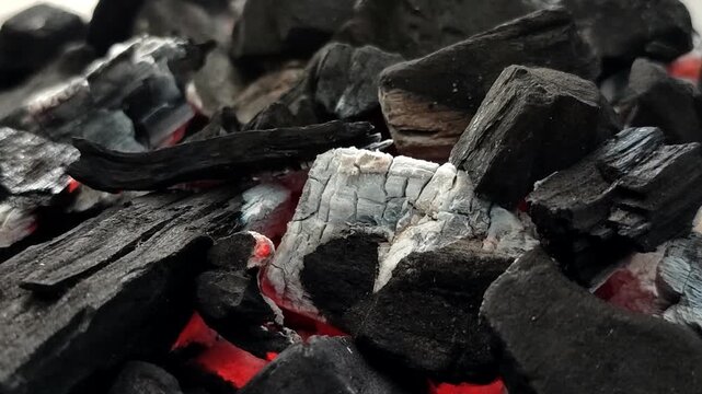 Hot burning charcoal with red embers and white ash. A stable, efficient, and smoke free heat source, this charcoal is ideal for domestic, culinary, and industrial use