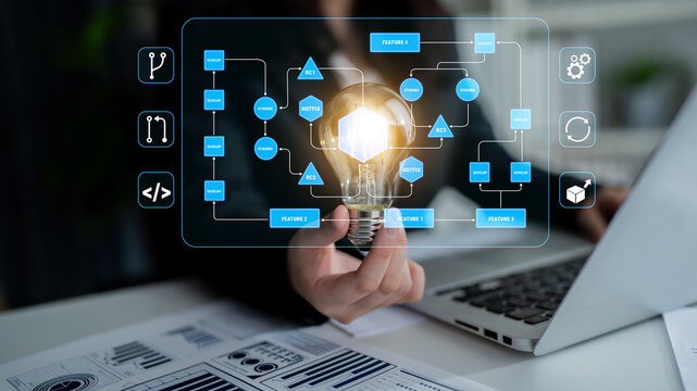 Innovative Light Bulb Symbolizing Ideas with Flowchart Elements Representing Technology and Digital Progress in Modern Workspace Concept Quark.