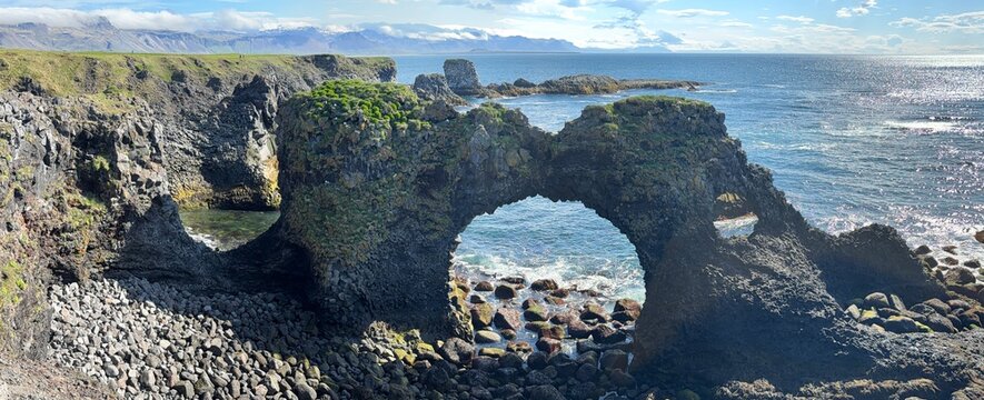 Panoramic view of Gatklettur natural sea arch between Arnarstapi and Hellnar on the Snaefellsnes peninsula
