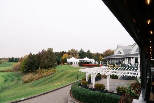 Angus Glen Golf Club exterior with white pergola and event tent