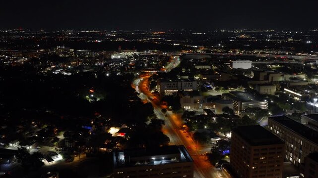 Aerial Night View of an Illuminated Football Stadium in Austin Texas Part 1 of 2