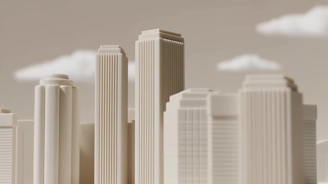 Slow dolly in of model skyscrapers shifting perspective across miniature city skyline in studio with soft cloudy background