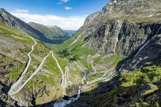 Trollstigen with waterfalls and mountains and winding roads, Norway