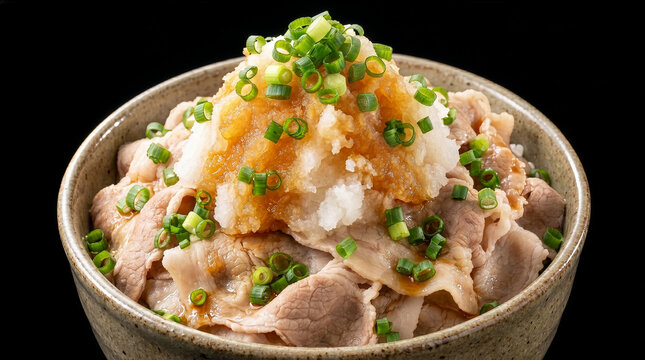黒背景に盛られた大根おろしとネギが乗った豚しゃぶおろし丼