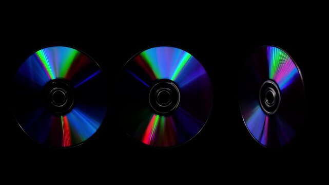 Rainbow light reflecting of a surface of a rotating CD-DVD disk