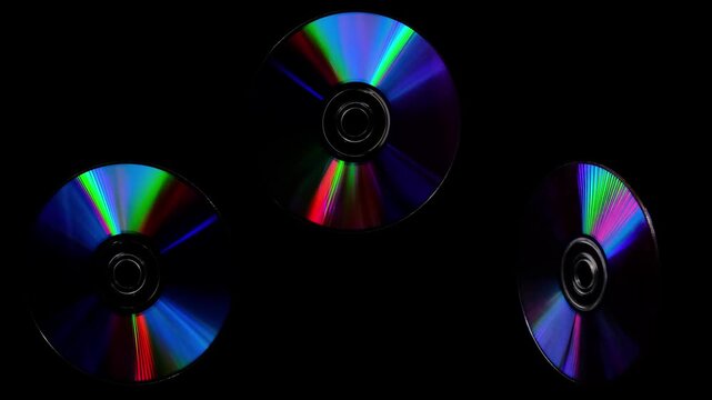 Rainbow light reflecting of a surface of a rotating CD-DVD disk