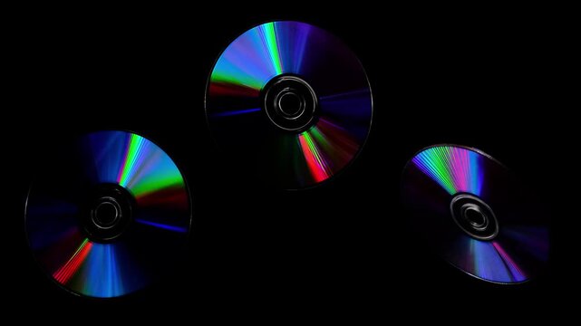 Rainbow light reflecting of a surface of a rotating CD-DVD disk