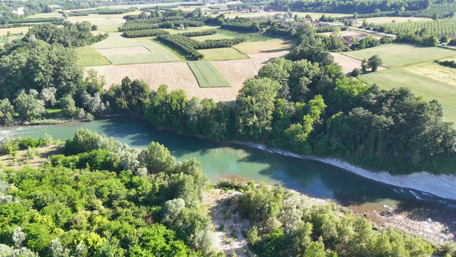 Aerial View of Tanaro River Winding Through Lush Piedmont Farmland