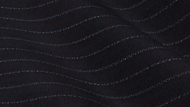 Italian Midnight Blue Pinstripe Wool Fabric rolling in corporate waves of dark background and tailored executive stripe pattern for business
