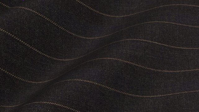 Italian Black Wool Fabric with Gold Pinstripes flowing in rich waves of luxurious tailored executive pattern for high end statement suits