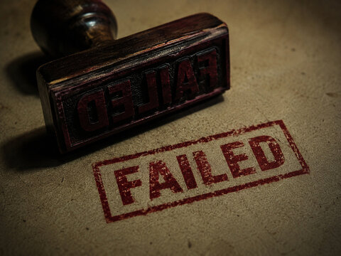 Failed red ink stamp on textured paper symbolizing consequences and accountability and conveying frustration and urgency in corporate review setting