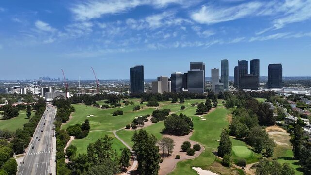 Aerial ascending shot of Century City skyline in sunny Los Angeles, California