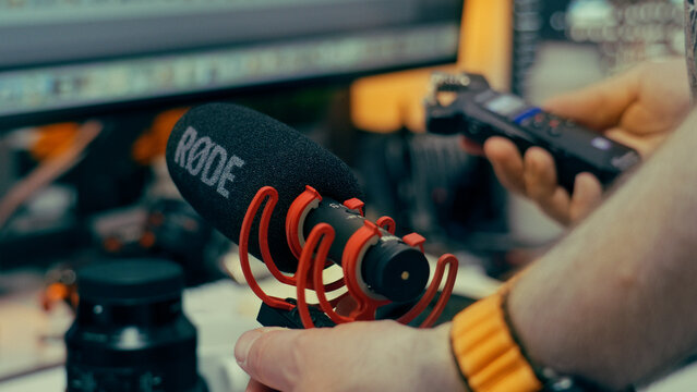 Content Creator Hands Holding Microphone Zoom Recorder