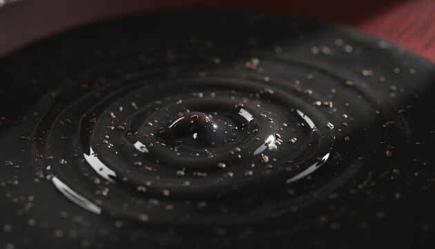 Premium black sesame paste Kuro Goma thick glossy swirling texture