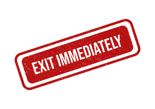 Red rubber stamp with the text exit immediately on a tilted angle