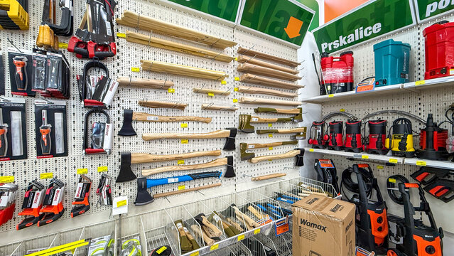 Bright hardware store hand tool display in warm fluorescent lighting suitable for retail catalogs product photography marketing and ecommerce use, 5 May 2026 Subitica, Serbia