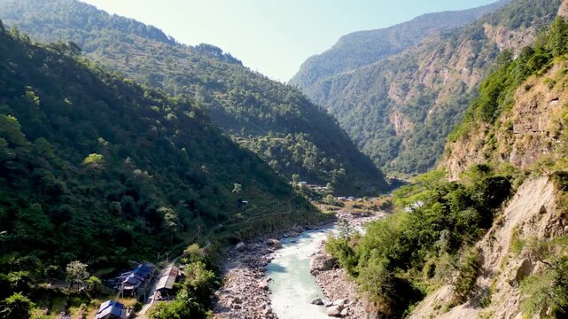 Aerial View of Budhi Gandaki River Flowing Through Forested Valley on Manaslu Circuit Trek, Nepal