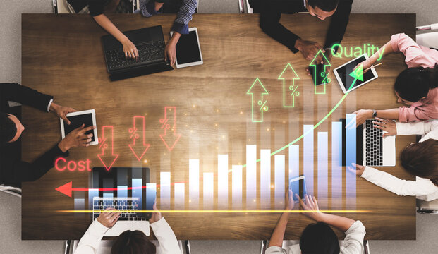 Business Meeting with Financial Charts and Graphs Showing Cost and Quality Analysis at a Modern Office Table. Bitwise.