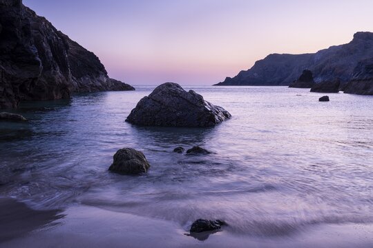 Coast and rocks in Kynance Cove. Evening, blue hour. Kynance Cove, Lizard Peninsula, Cornwall, England, Great Britain