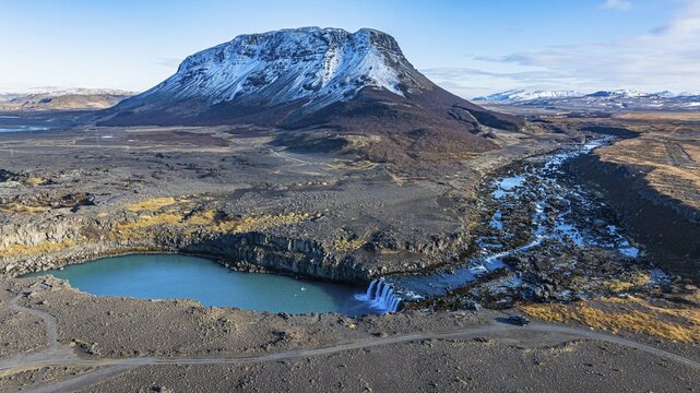 Pjofafoss waterfall, Burfell mountain in the background, drone shot, Sudurland, Iceland