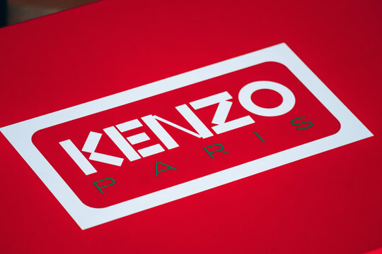 Nice, France - March 1, 2026: Close-up of a red Kenzo Paris branded gift box featuring the house logo, packaging design and luxury fashion presentation details
