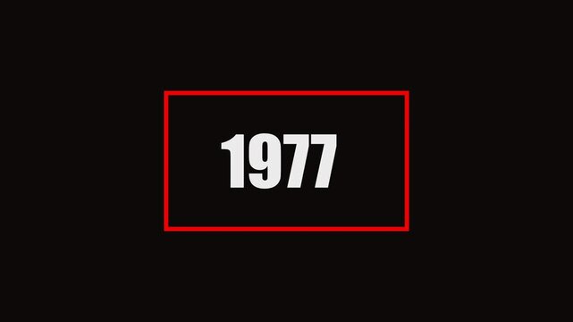 1977 number animation on black background. Old film style historical year loop. White 1962 number text with rectangle animation..