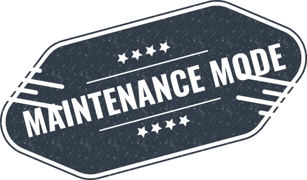 Maintenance mode sign with star details on a dark vintage style textured geometric shaped board