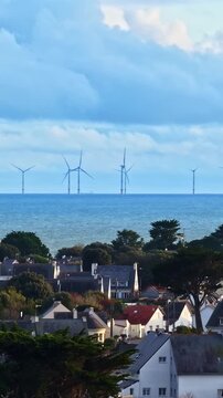 Floating offshore windturbines overlooking Le Croisic commune France