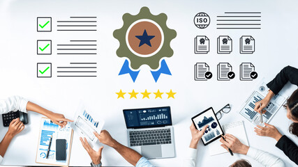 Fototapeta premium Diverse professionals collaborate on quality management, showcasing ISO certification, charts, and checklists in a modern office setup, emphasizing teamwork and efficiency. Cyphers