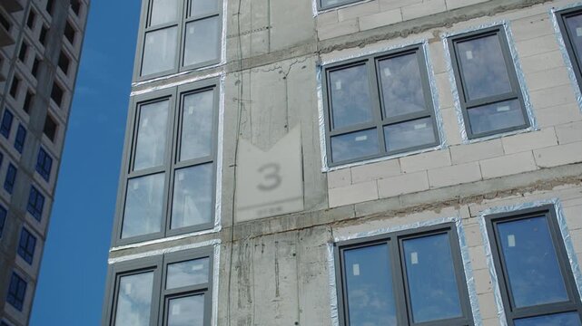 Modern apartment building facade with windows