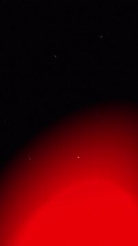 Crimson Gradient Light Sweeps with Floating Dust Particles on Deep Black Atmosphere for Moody Backdrop 4k video