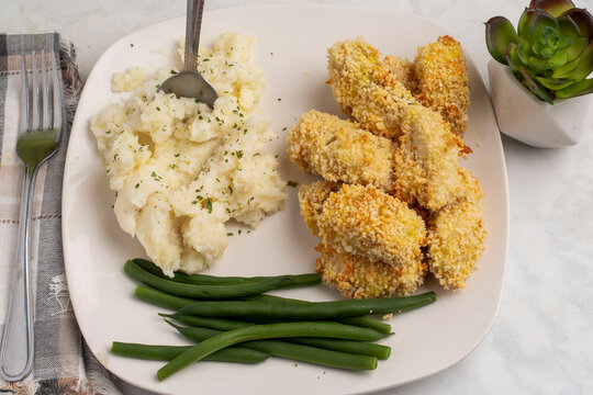 haddock bites with mash potatoes  top with parsley