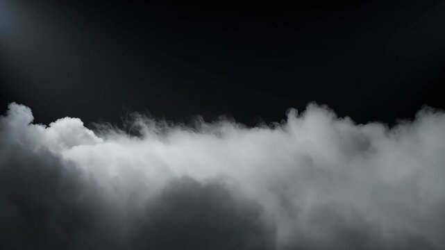White dense smoke cloud spreading and expanding in a dark mysterious room. Jet of vapor or fog slowly moving across a black background creating a dramatic effect